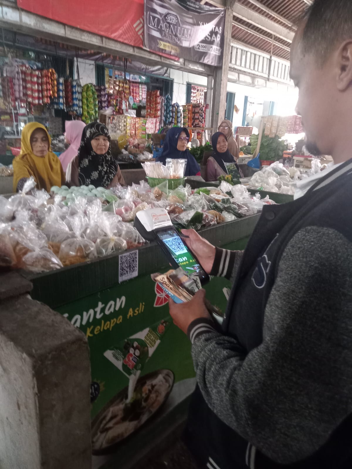 penarikan e-retribusi atau pembayaran retribusi non tunai di pasar rakyat